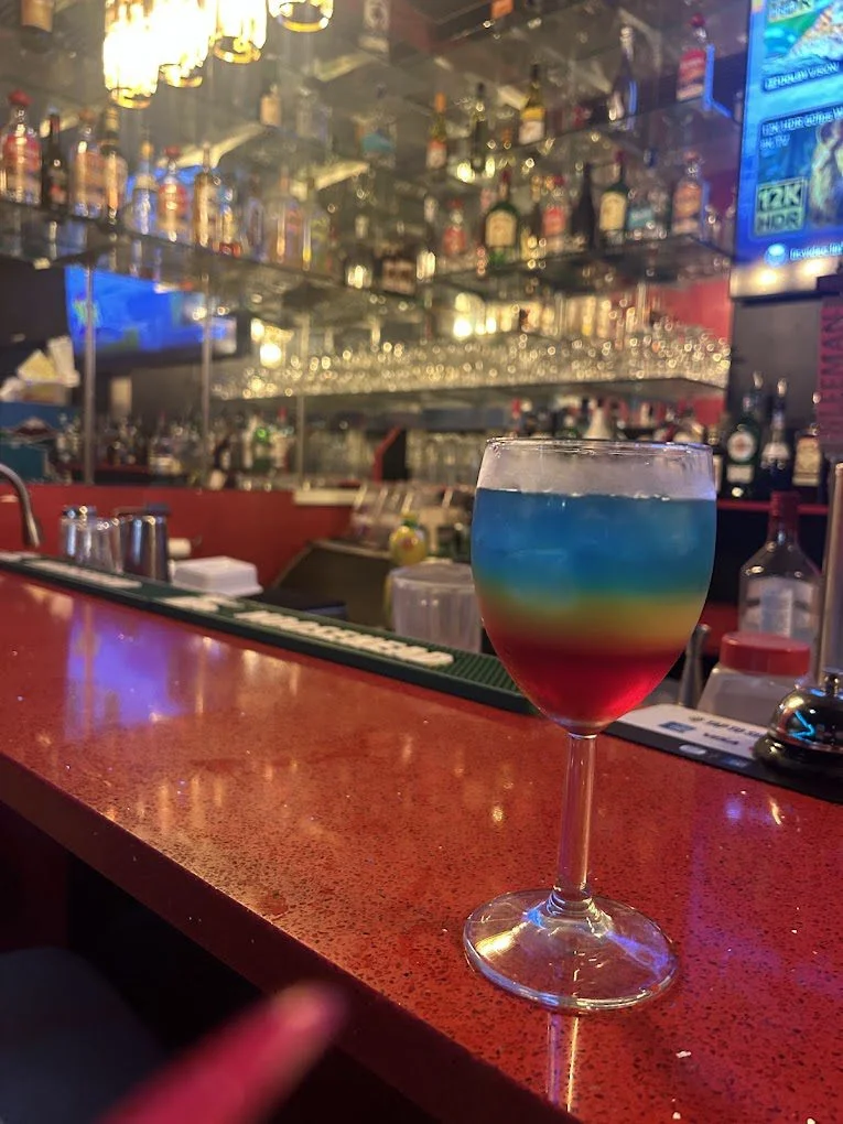 Layered blue Hawaiian cocktail